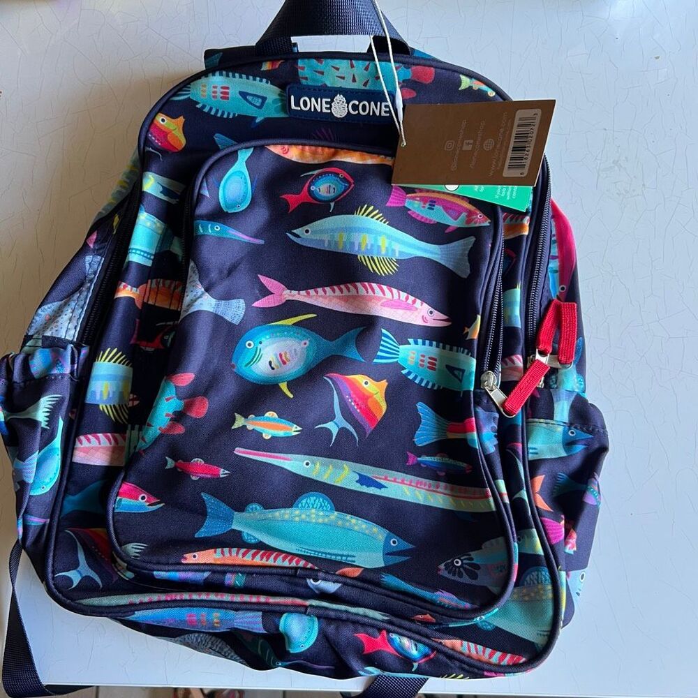 Lone Cone Kids Backpack a colorful fish print on a dark navy background